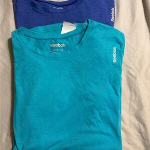 Reebok Women's Teal and Blue Short Sleeve Tops longer in back cotton/poly